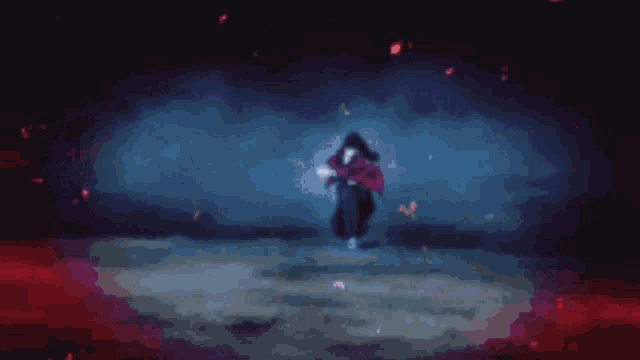 a blurry picture of a person in a red and black costume