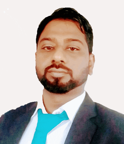 a man with a beard wearing a suit and tie poses for a picture