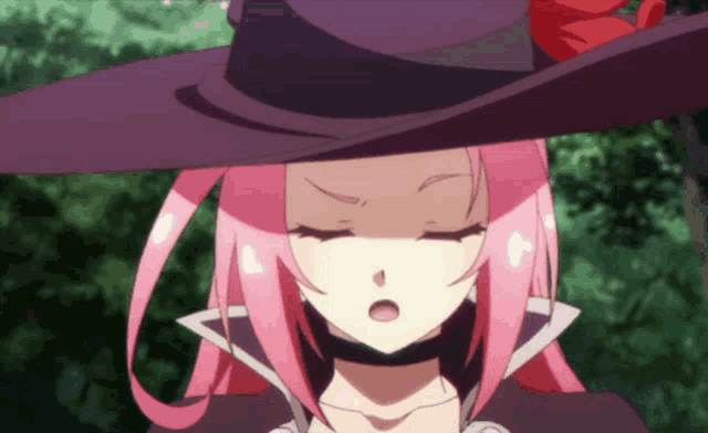 a girl with pink hair is wearing a hat