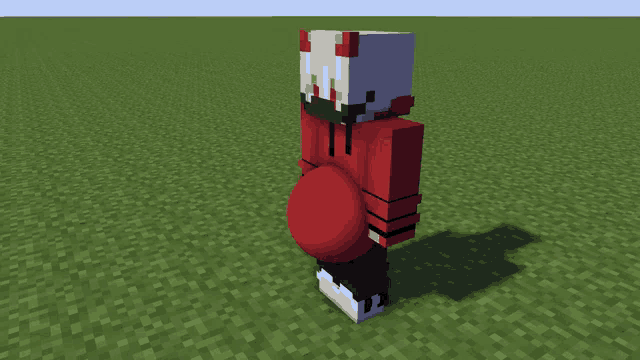 a minecraft character is holding a red ball in his stomach