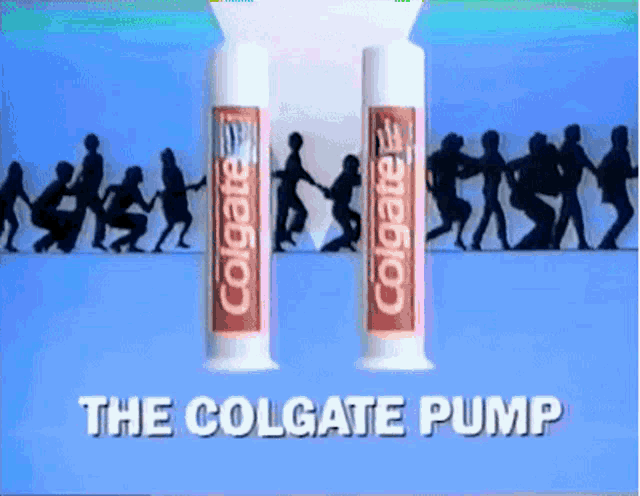 two tubes of colgate toothpaste are on a blue surface