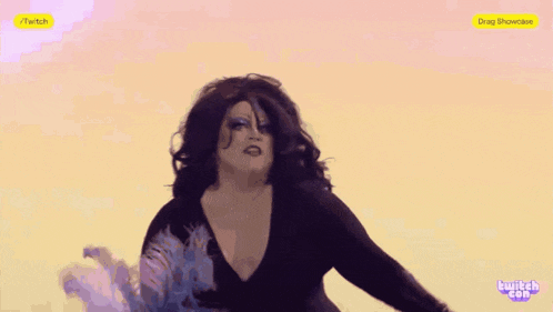 a drag queen is on a screen that says twitch on it