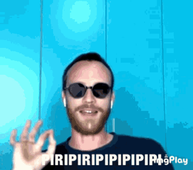 a man with a beard wearing sunglasses says piripiripipipipi