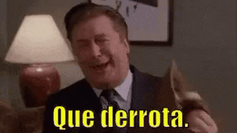 a man in a suit and tie is holding a piece of paper with the words `` que derrot . ''
