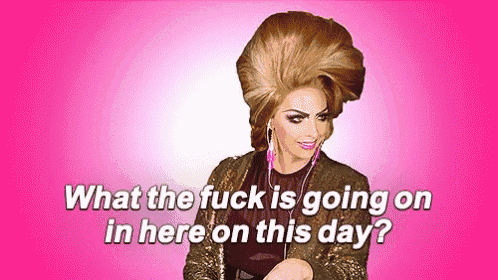 a drag queen is wearing headphones and has a big hairdo on a pink background .