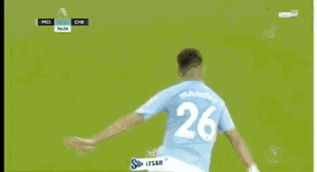 a soccer player is celebrating after scoring a goal during a soccer game .