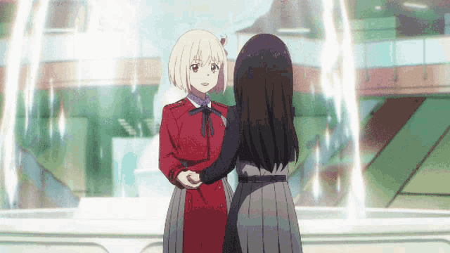 two anime girls hugging each other in front of a window