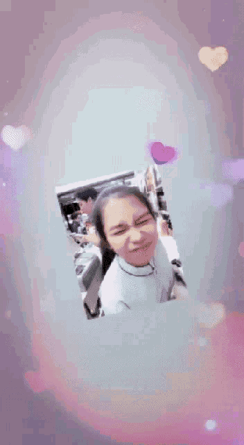 a picture of a girl with a purple background and hearts