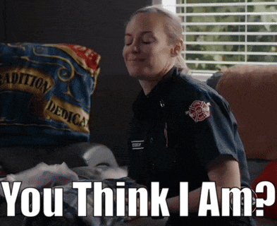 a woman in a firefighter uniform is sitting on a couch and says you think i am