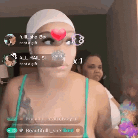 a woman wearing a white headband and a green tank top is on a live stream