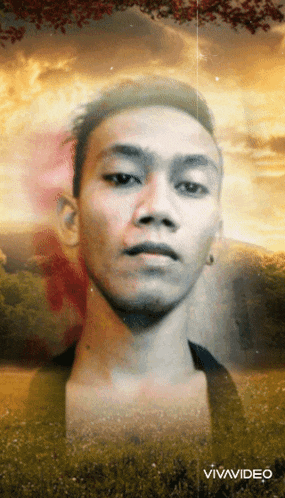 a young man 's face is displayed in a video that says vivavideo