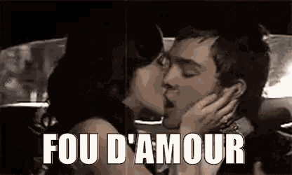a man and a woman are kissing in a car and the woman is saying `` fou d ' amour '' .