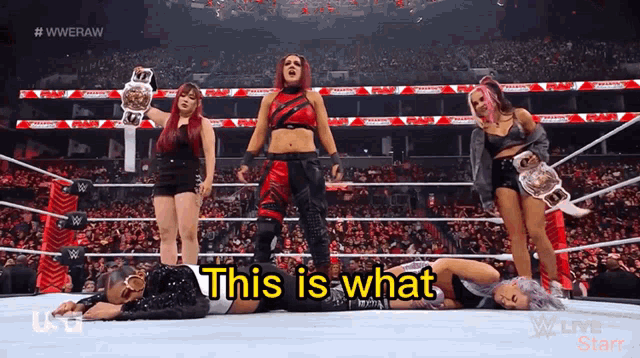 a group of women in a wrestling ring with the words this is what