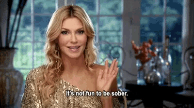 a woman in a sequined dress is saying it 's not fun to be sober