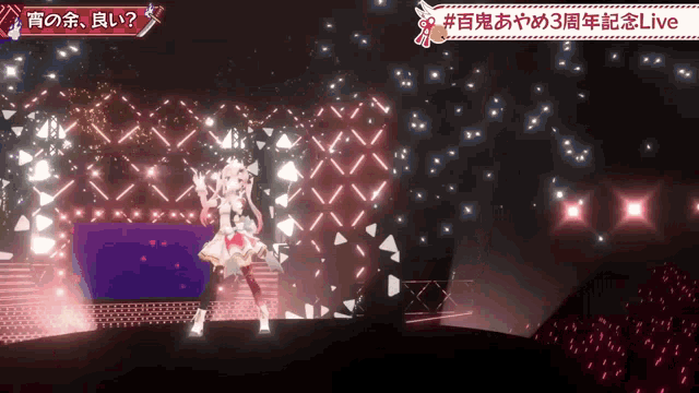 a girl is dancing on a stage with a sign that says # live