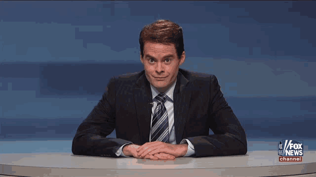 a fox news channel advertisement with a man in a suit and tie