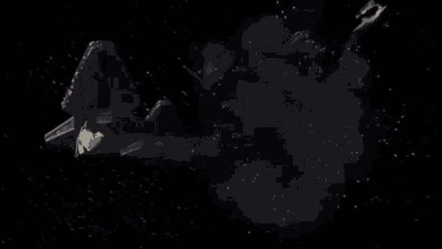 a yellow and gray star wars fighter jet is flying in space .