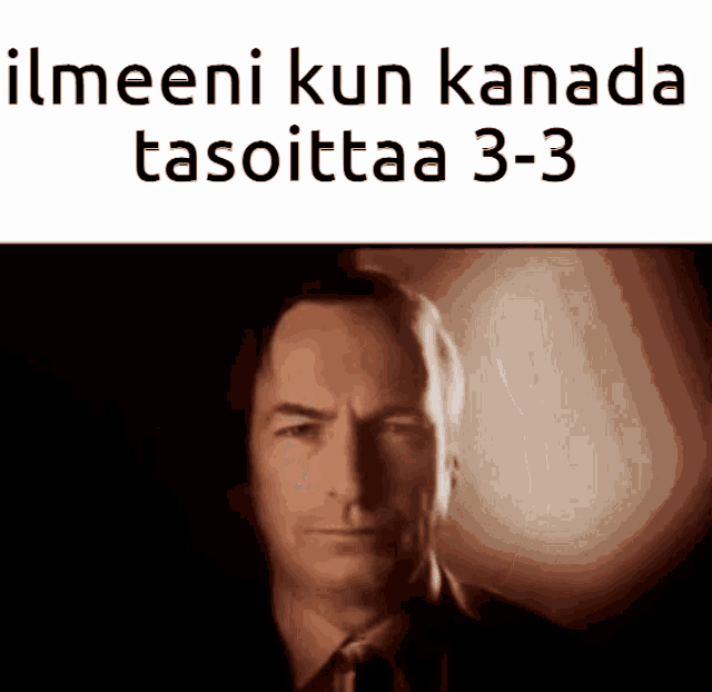 a man in a suit and tie with the words ilmaeni kun kanada tasoittaa 3- 3 above him