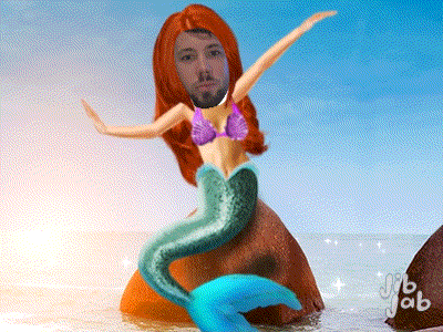 a picture of a mermaid with a man 's face on her head