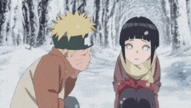 a man and a girl are standing in the snow