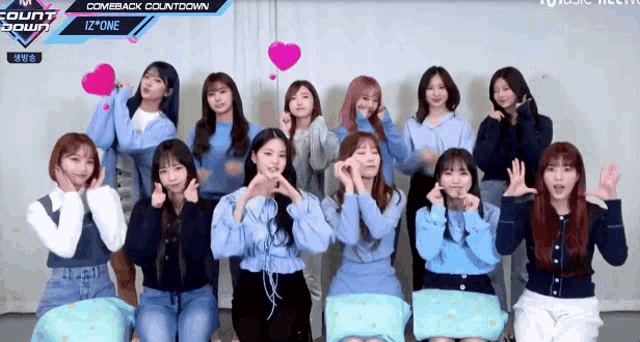 a group of girls are posing for a picture with the words comeback countdown behind them