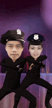 a man and a woman in police uniforms are dancing together