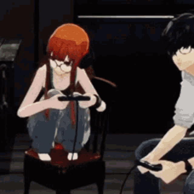 a man and a woman are playing a video game together