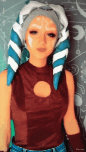 a woman in a star wars costume has a circle in her chest