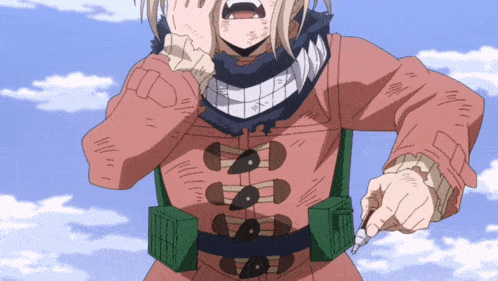 a girl with a scarf around her neck is holding a lighter in her hand
