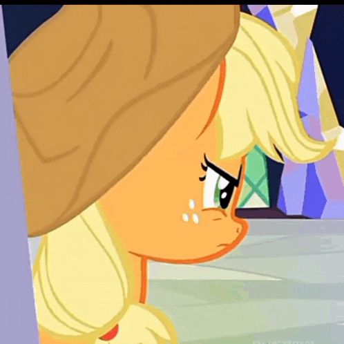 a close up of a cartoon pony with tears in her eyes