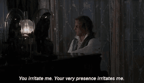 a man sits at a piano and says you irritate me