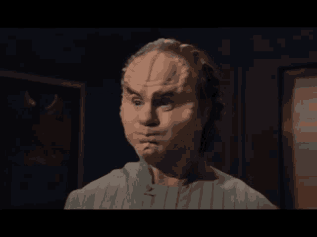 a close up of a person 's face with a very strange face