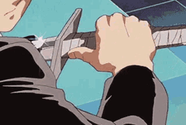 a cartoon character is holding a sword in his hand .