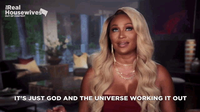 a woman says " it 's just god and the universe working it out " in front of a sign that says real housewives
