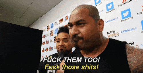 a man says " fuck them too fuck those shits " in front of a wall