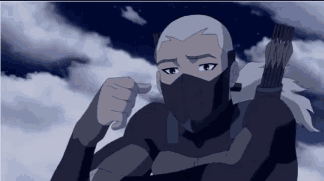 a cartoon character with a mask on his face is pointing at the camera .