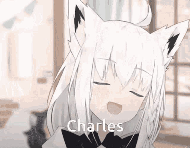 a white anime girl with black ears and the name charles on her face .