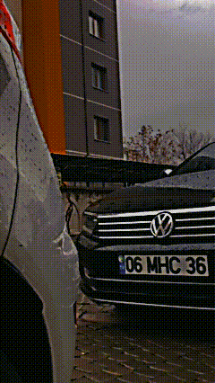 a black volkswagen with license plate 06 mhc 36