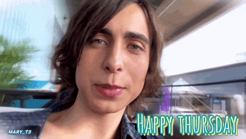 a happy thursday message is displayed on a photo of a man