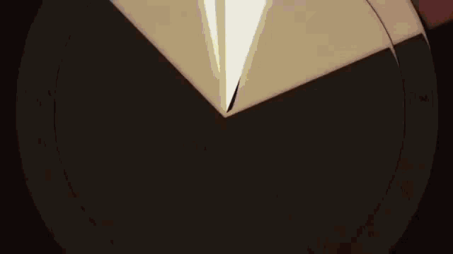 a close up of a circle with a light coming out of it