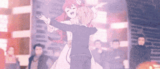 a couple of anime characters are dancing together in front of a crowd of people .