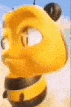 a close up of a yellow cartoon character with a collar around its neck .