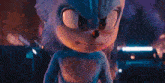 a close up of a stuffed animal making a funny face .