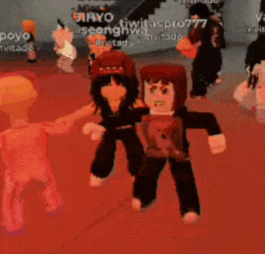 a group of people are dancing on a red floor in a room .