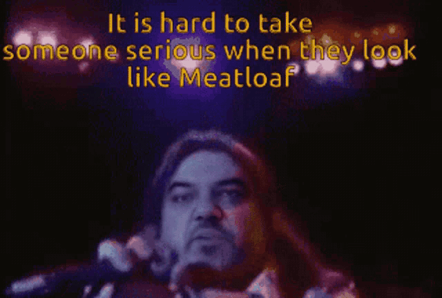 a man with long hair and a beard says it is hard to take someone serious when they look like meat loaf