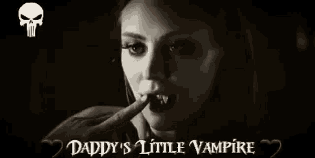 a black and white photo of a woman with vampire teeth