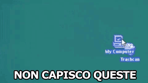 an elderly man is sitting in front of a computer with the words `` non capisco queste '' written on the screen .