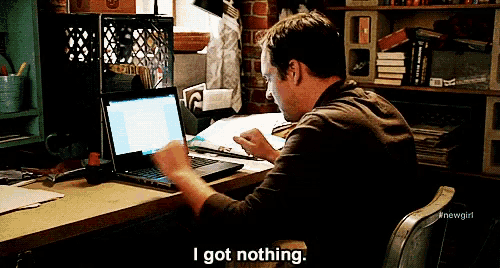 a man is sitting at a desk with a laptop and says i got nothing