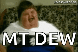 a fat man is sitting on a couch with the words `` mt dew '' written on his chest .