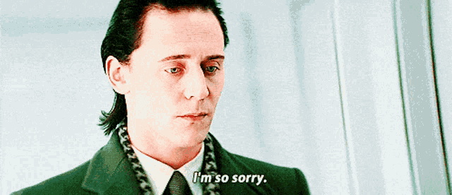 a man in a suit and tie is saying i 'm so sorry .